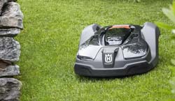 Husqvarna 450X cutting grass